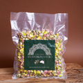 500g bag of Pistacchio Di Sicilia by Mandorlino d'olio, showcasing vibrant green pistachios in a resealable package.