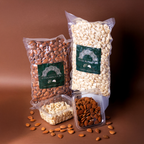 Sicilian blanched almonds in a 1 kg bag by Mandorlino d'olio, showcasing natural almond texture and color.